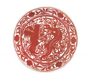 A Ruby Lustre Arts and Crafts Ceramic Charger, attributed to William de Morgan
