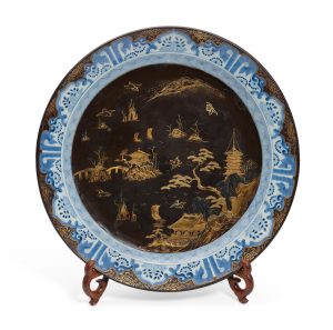 A Chinese export porcelain and lacquered charger late 19th century