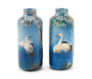 A Pair of doulton Titanian ware vases with storks by harry allen