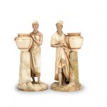 A rare pair of Royal Worcester figures of African water carriers, dated 1887-88