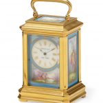 A French gilt brass and porcelain miniature carriage timepiece retailed by Tiffany & Co., New York circa 1900