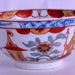 18th c. Worcester tea bowl painted with flowers in underglaze blue