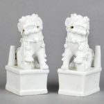 Pair of Chinese Blanc-de-Chine Porcelain Figures of Foo Lions